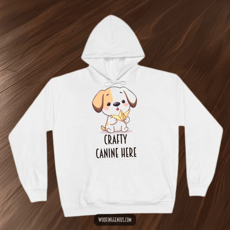 Funny origami dog hoodie: a proud dog presents a small, intricately folded paper crane, symbolizing artistic endeavor and cozy warmth.