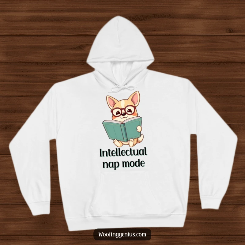 Funny dog wearing spectacles holding a huge ancient book, looking enlightened on a soft hoodie, ultimate cozy wisdom.